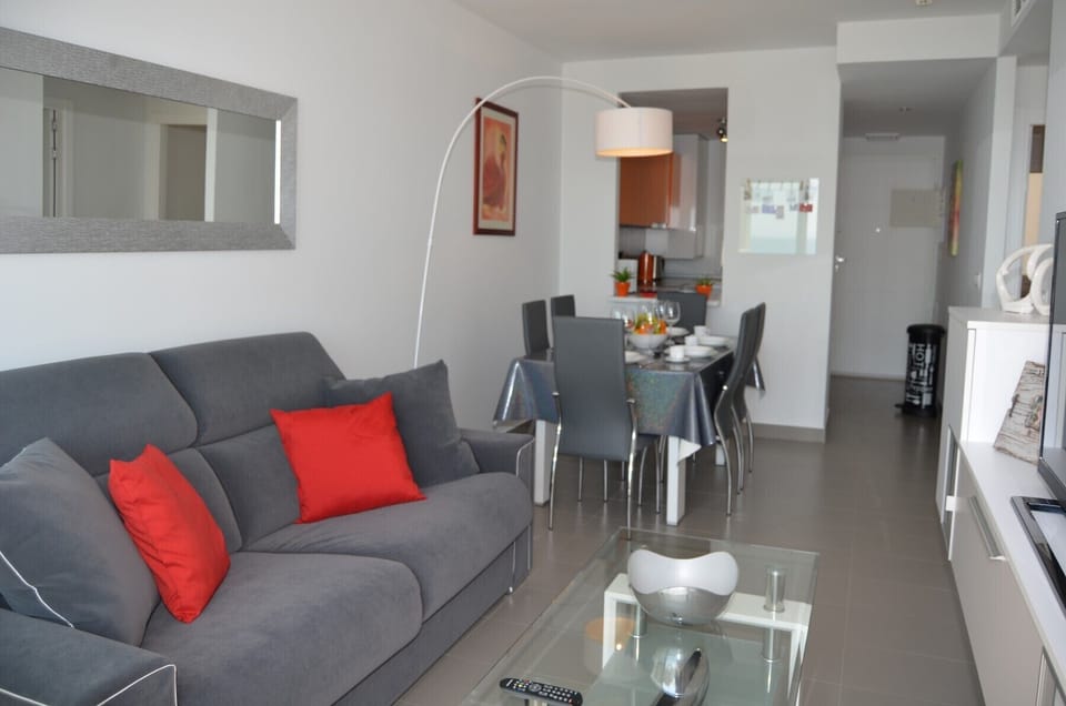 Modern living room equipped with T.V and comfortable furniture