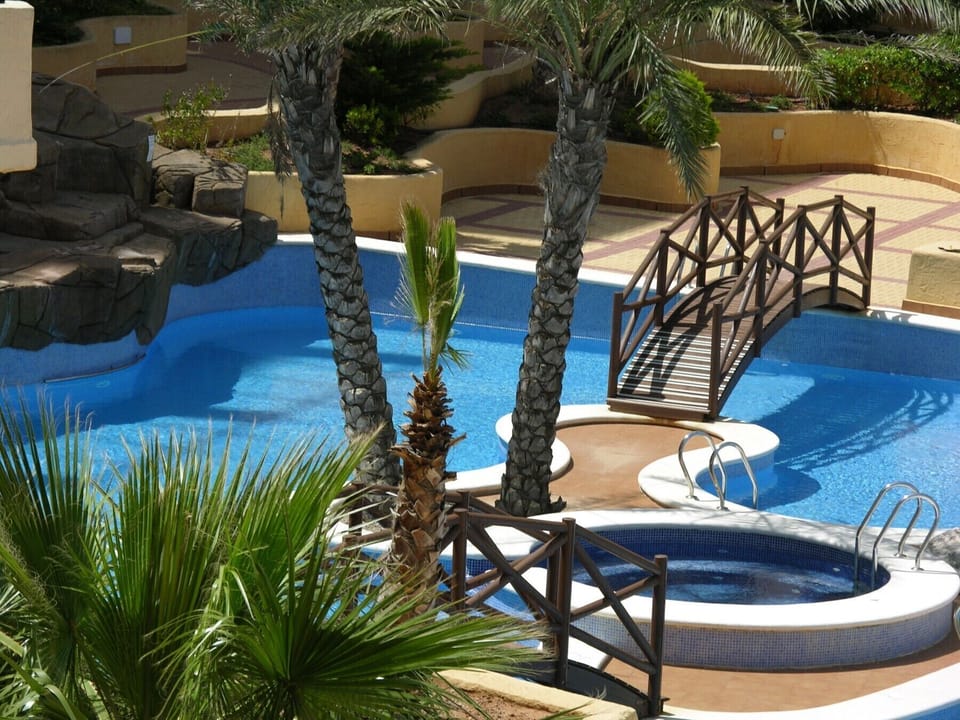 One of the lovely swimming pool at Verdemar apartment and is perfectly ideal for relaxing.