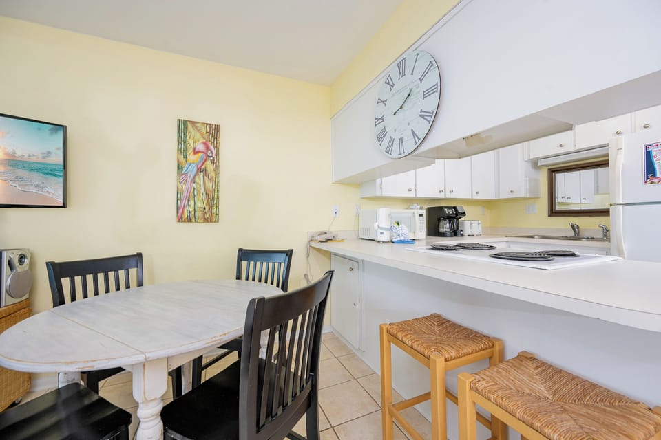 Enjoy lively conversations in the cozy dining area as you savor snacks and laughter with loved ones
