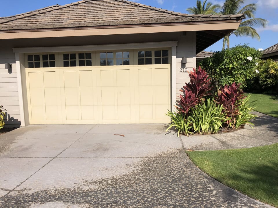 External view of home w:two-car garage. This is unit #210.