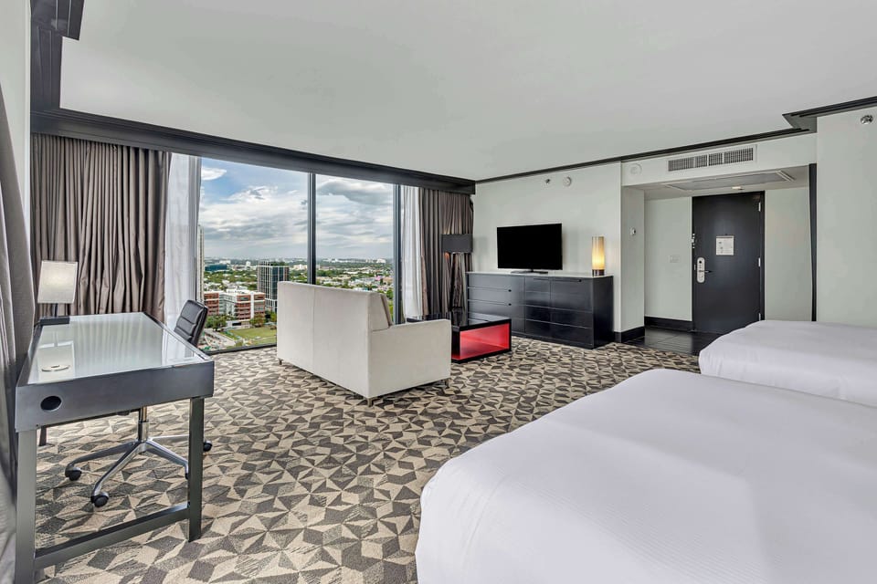 Premium bedding, down comforters, pillowtop beds, in-room safe