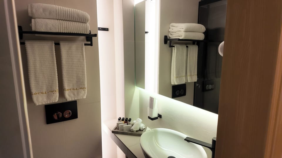 Shower, free toiletries, hair dryer, bathrobes
