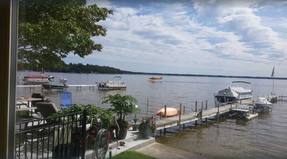 Plane landing on the lake during summertime 