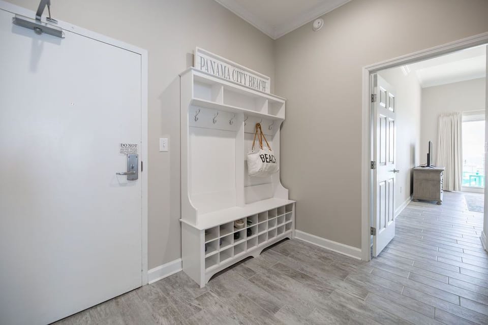 “Mud room” off front door.  Perfect t for towels, flip flops etc 