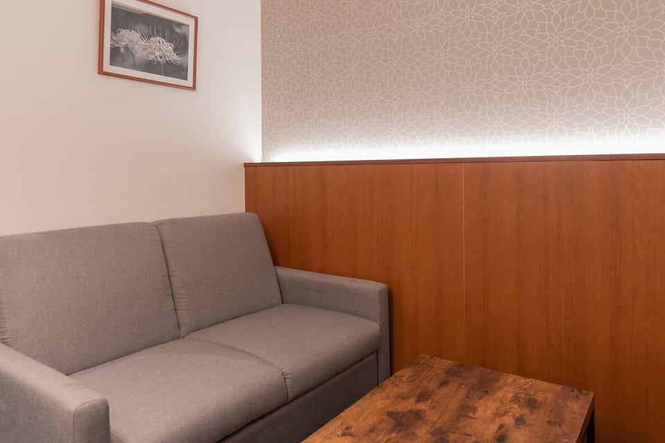 Family Room (No Housekeeping During Stay) | Living area | Flat-screen TV