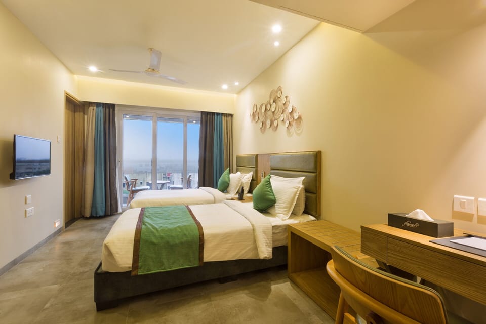 Premium bedding, memory foam beds, in-room safe, desk