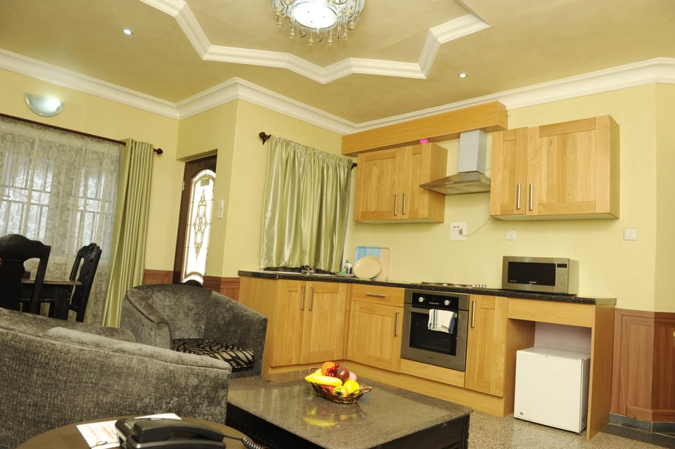Family Single Suite | Living area | LCD TV
