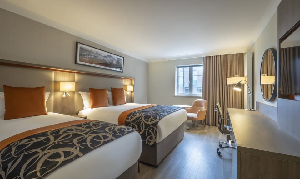 Hypo-allergenic bedding, in-room safe, desk, laptop workspace