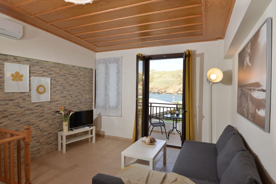 Superior Apartment | Living room | 33-inch flat-screen TV with satellite channels, LED TV