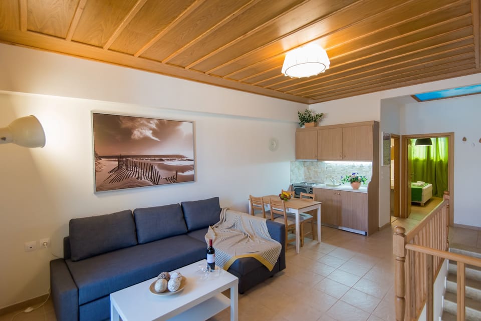 Superior Apartment | Living area | 33-inch flat-screen TV with satellite channels, LED TV