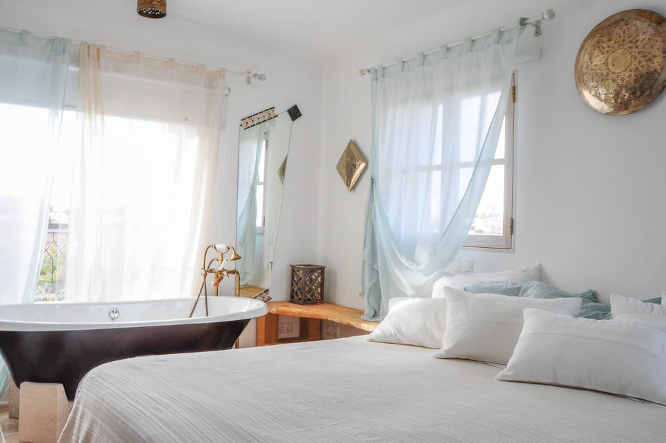 Superior Suite, 1 King Bed, Ocean View | Pillowtop beds, in-room safe, individually decorated