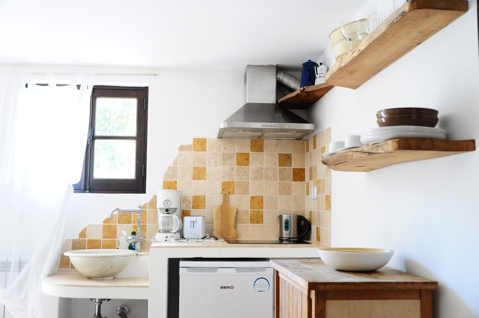 Apartment, 1 Bedroom | Private kitchen | Fridge, coffee/tea maker, cookware/dishes/utensils, freezer