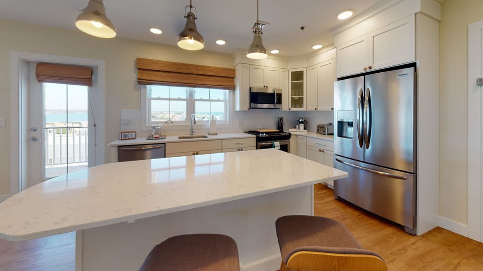 Winnapaug Pond Suite | Living area | Flat-screen TV