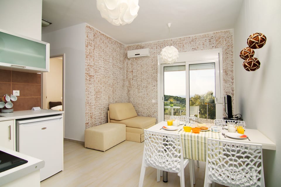 Apartment, 2 Bedrooms, Pool Access, Sea View | Living area | LCD TV, DVD player