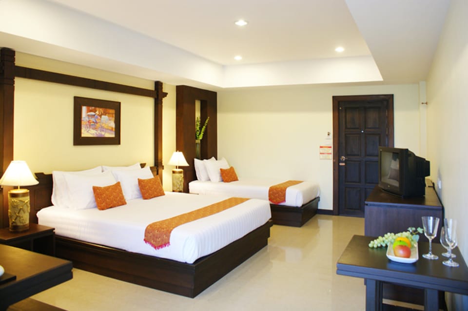 Standard Triple Room | Select Comfort beds, in-room safe, desk, blackout drapes