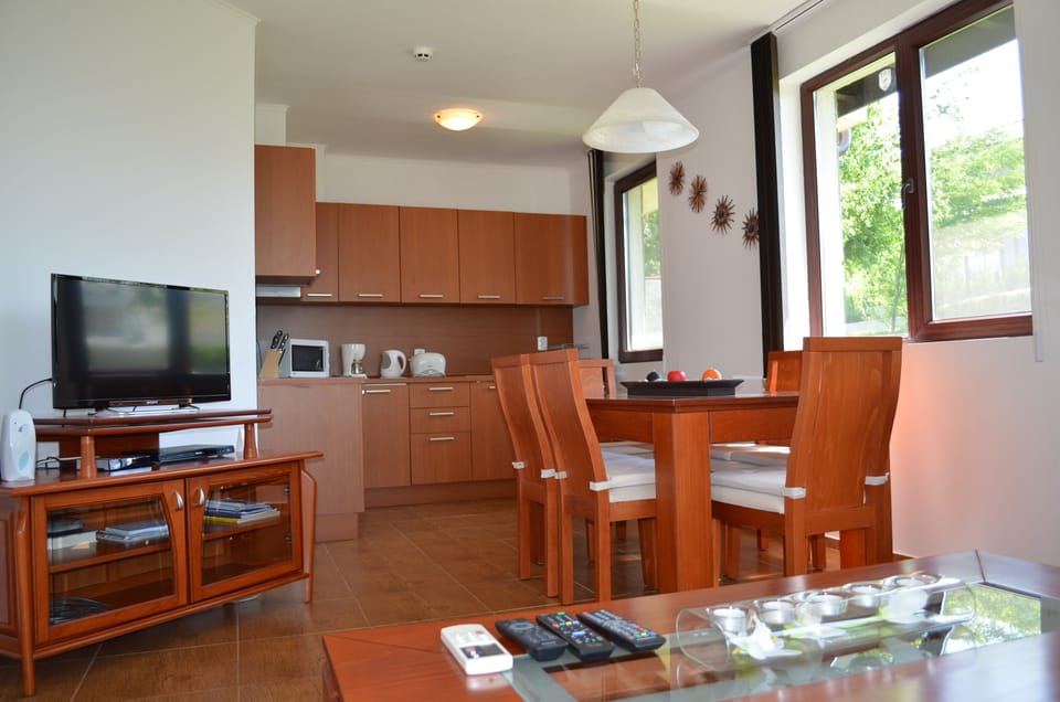 Fully fitted integrated Kitchen and Dining area. An open concept. LED television