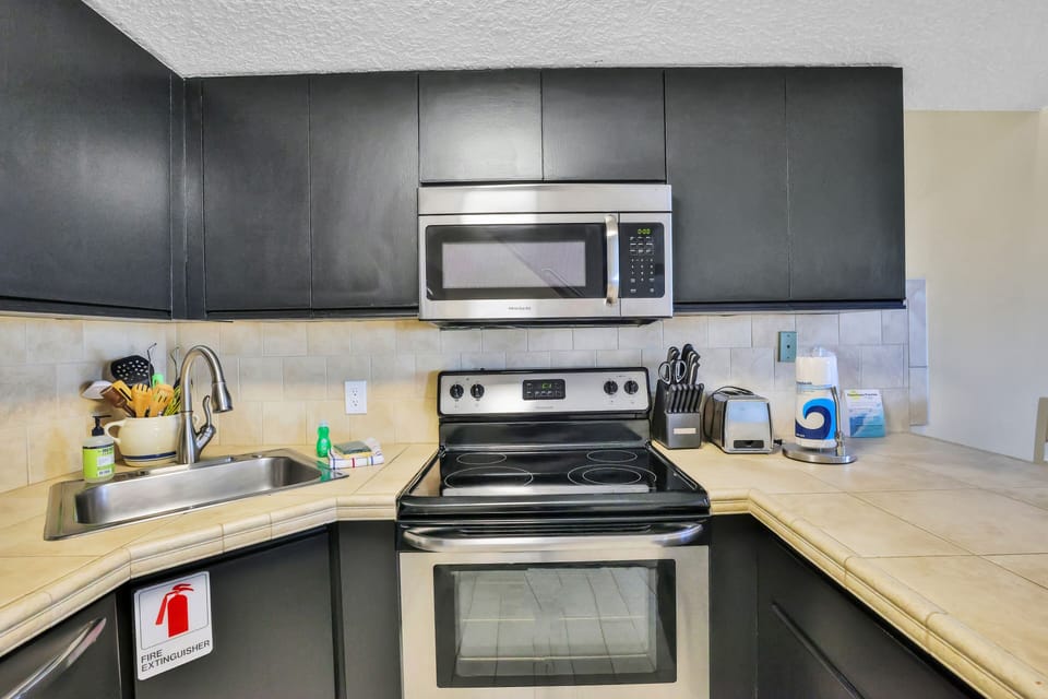 Modern appliances in the sleek kitchen