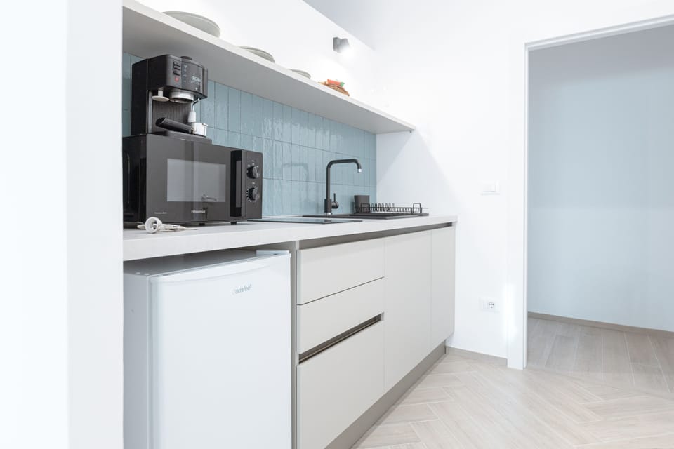 Apartment | Private kitchen | Fridge, microwave, coffee/tea maker