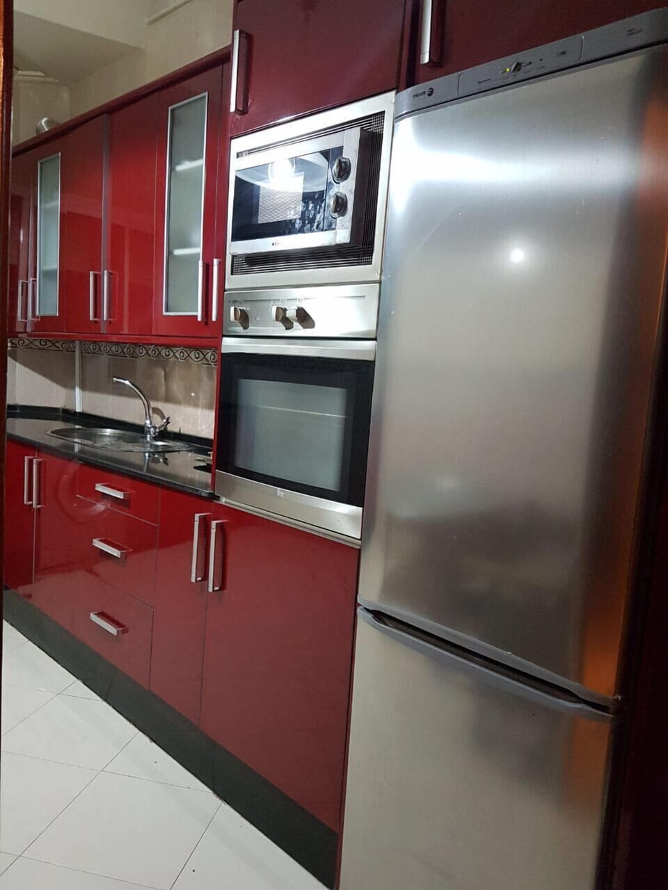 Apartment, 3 Bedrooms | Private kitchen | Full-size fridge, microwave, oven, stovetop