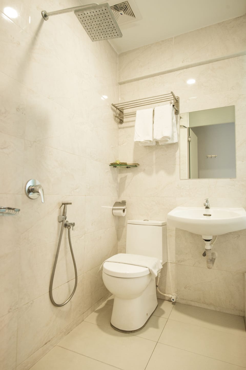 Shower, free toiletries, hair dryer, towels