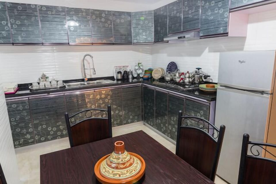 Apartment, 3 Bedrooms | Private kitchen | Full-size fridge, stovetop, cookware/dishes/utensils