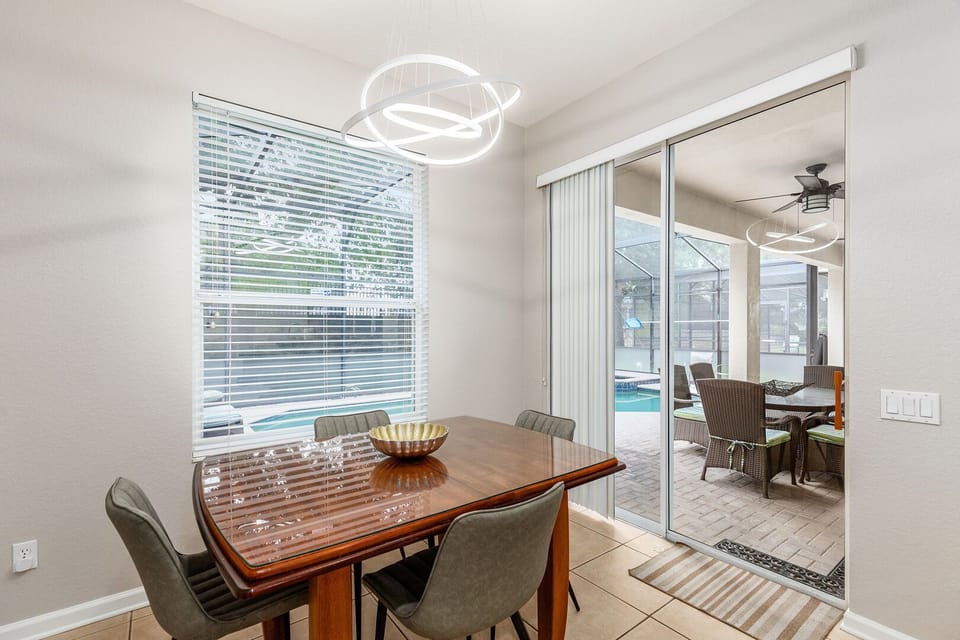 Eat a meal in the breakfast nook and then head out to the pool and patio