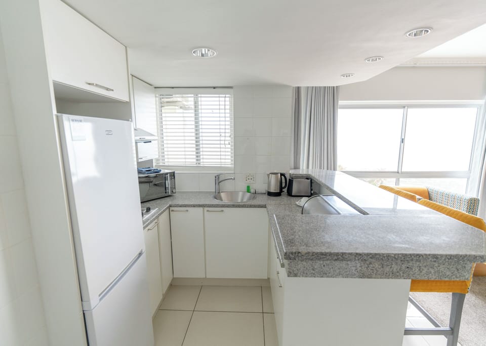Suite, 1 Bedroom | Private kitchen | Full-size fridge, microwave, stovetop, dishwasher