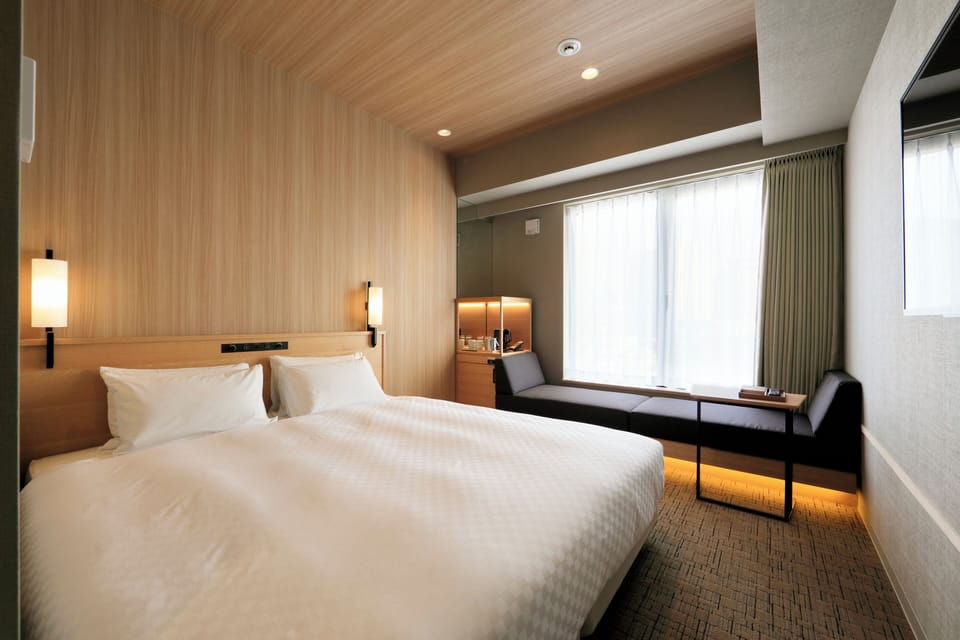 Premium bedding, desk, iron/ironing board (on request), WiFi (free)