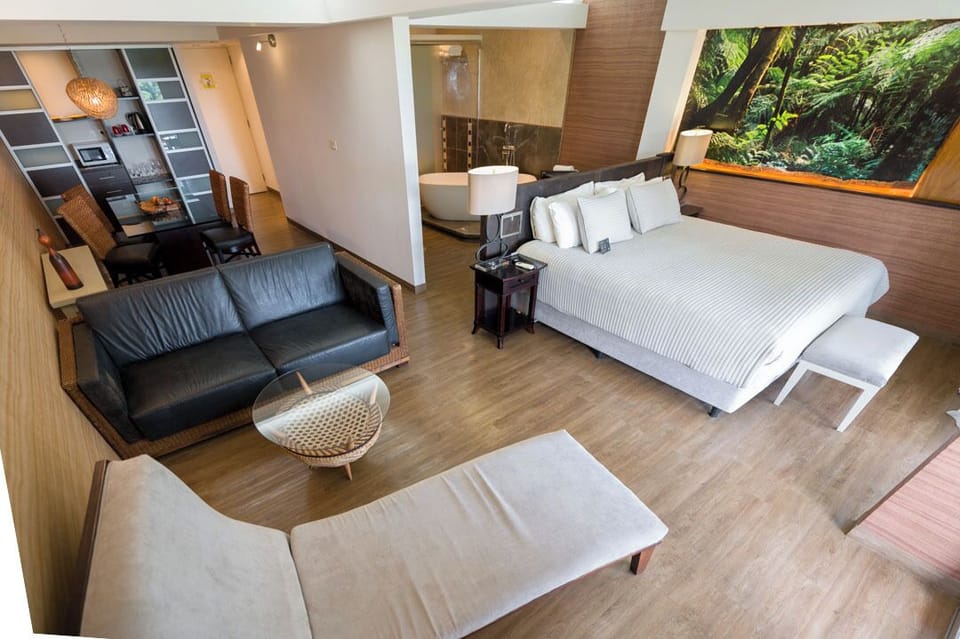 Suite (Suite with river view) | Premium bedding, minibar, in-room safe, desk