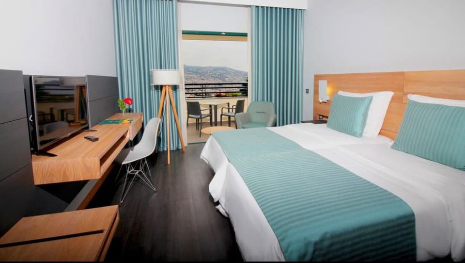 Double or Twin Room, Mountain View | Minibar, desk, blackout drapes, rollaway beds