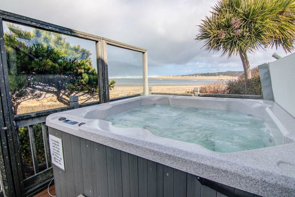 Sheltered hot tub.
