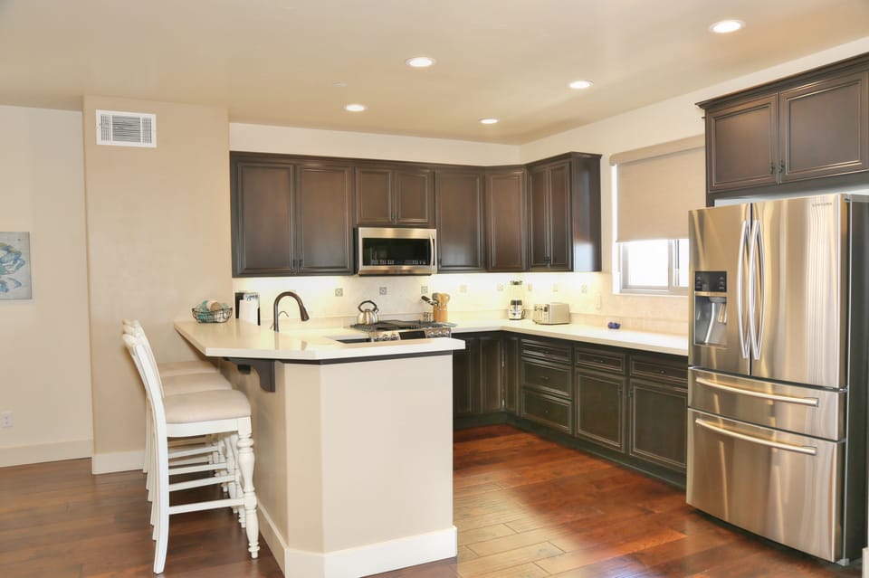 Kitchen with bar seating for 3