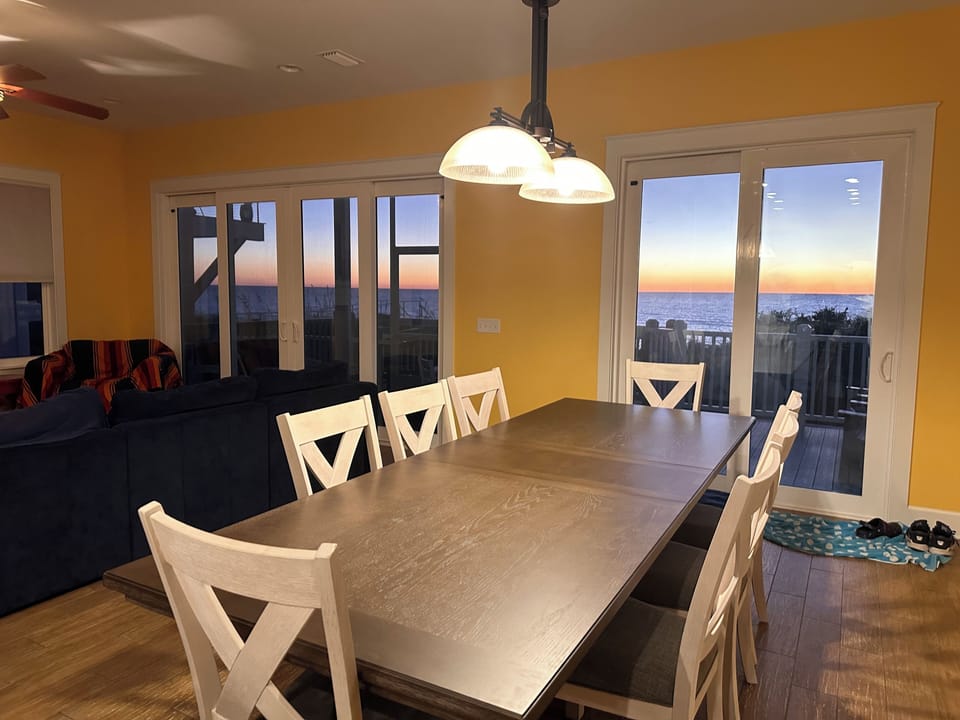 Dining room and living space from from kitchen at sunset