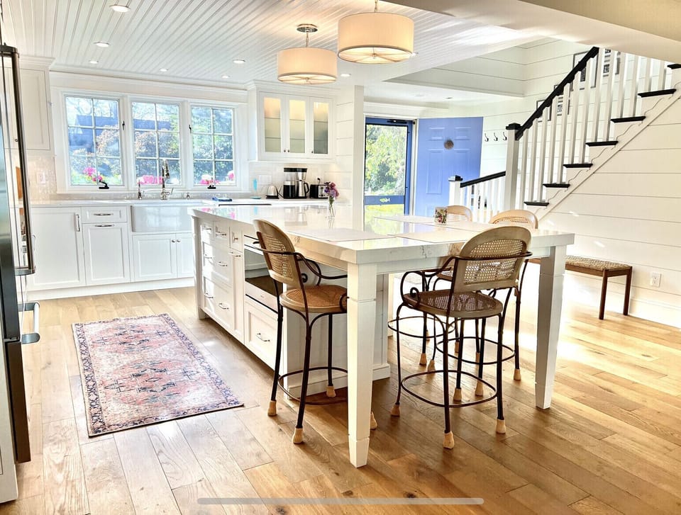 New Chef’s Kitchen, 2022. Cape oak floors run throughout the brightly lit space.