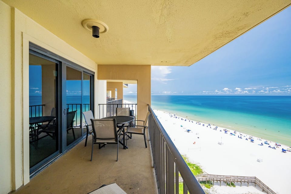 Step onto the balcony from the 14th floor to savor breathtaking views of the pristine beach while enjoying outdoor dining