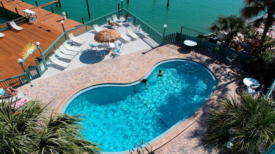 Watch for dolphins as you relax poolside in our heated pool!