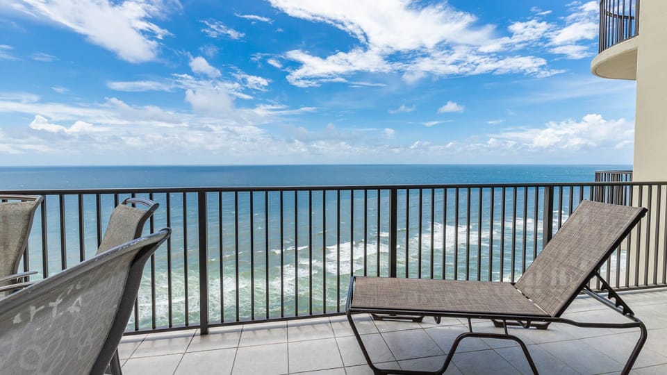 Lounge on your balcony overlooking the stunning gulf coastline and doze to the sound of waves and seagulls