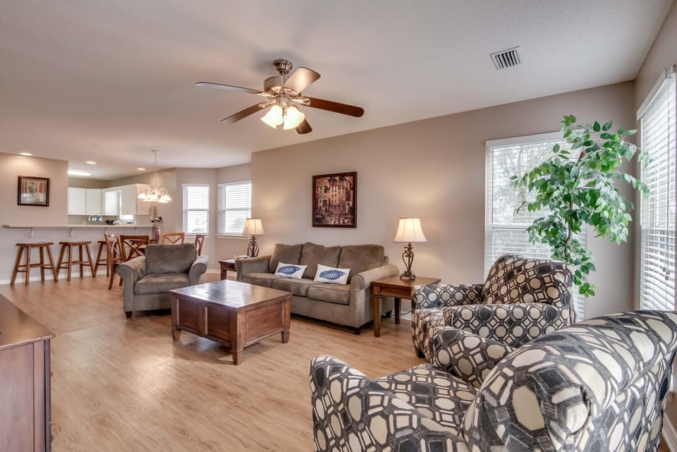Living/Dining Area - The large, yet cozy open living and dining area offers a great space to enjoy quality time as a group as well as plenty of seating space for every one.