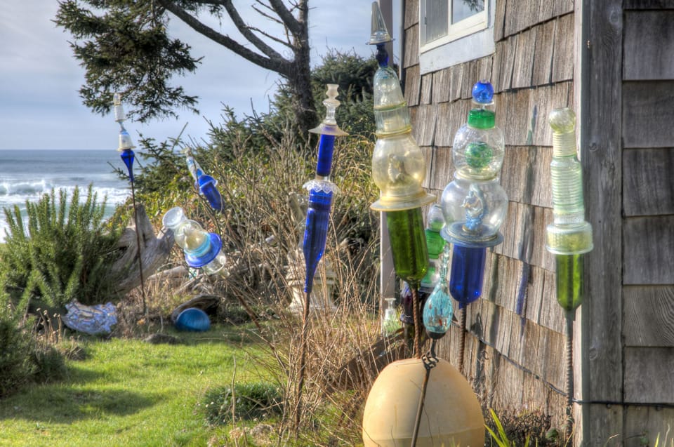 Abalone beach cottage welcomes you with whimsical art glass and fun touches.