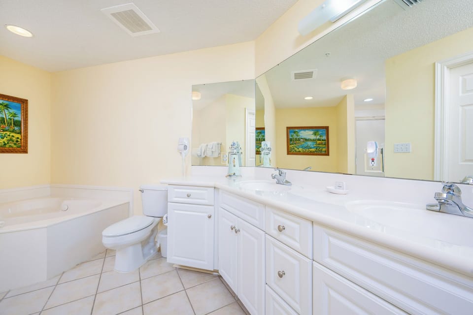 Unwind in the spacious jetted tub, letting the warmth embrace you for a refreshing retreat after a fun day