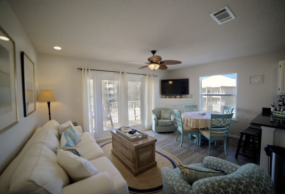 Family Room & Dining area with view to balcony