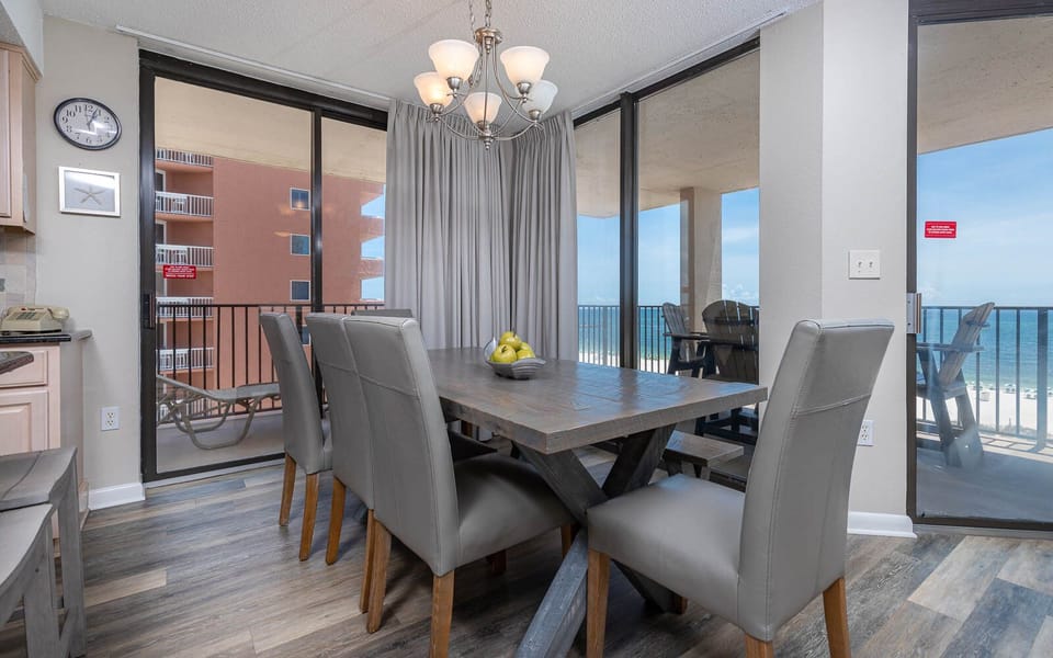 Dine with a beach view as you enjoy meals at the table, surrounded by natural light and coastal breezes
