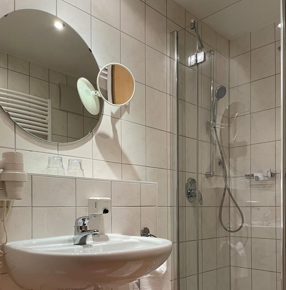 Shower, free toiletries, hair dryer, towels