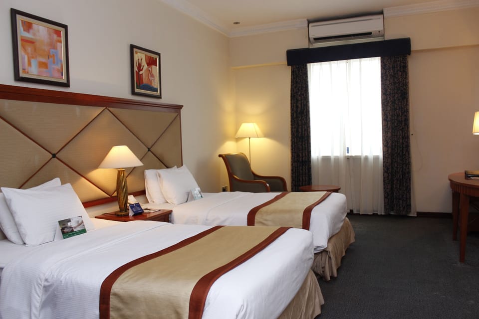 In-room safe, free WiFi, bed sheets, alarm clocks