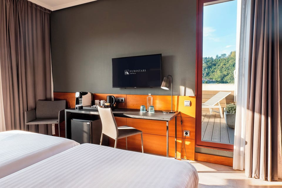 Down comforters, minibar, in-room safe, desk
