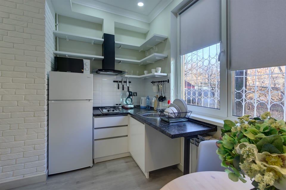 Grand Apartment, 1 Queen Bed with Sofa bed, Courtyard View, Ground Floor | Private kitchen | Espresso maker, full-size fridge, microwave, stovetop