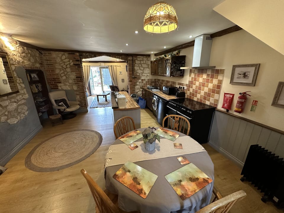 Family Cottage, 2 Bedrooms, Partial Sea View, Beachside | Private kitchen | Fridge, eco-friendly cleaning products