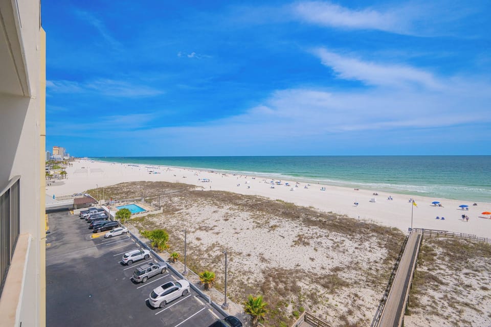 Enjoy vibrant beach vibes from your balcony, where you can soak in expansive views and the sounds of the shore