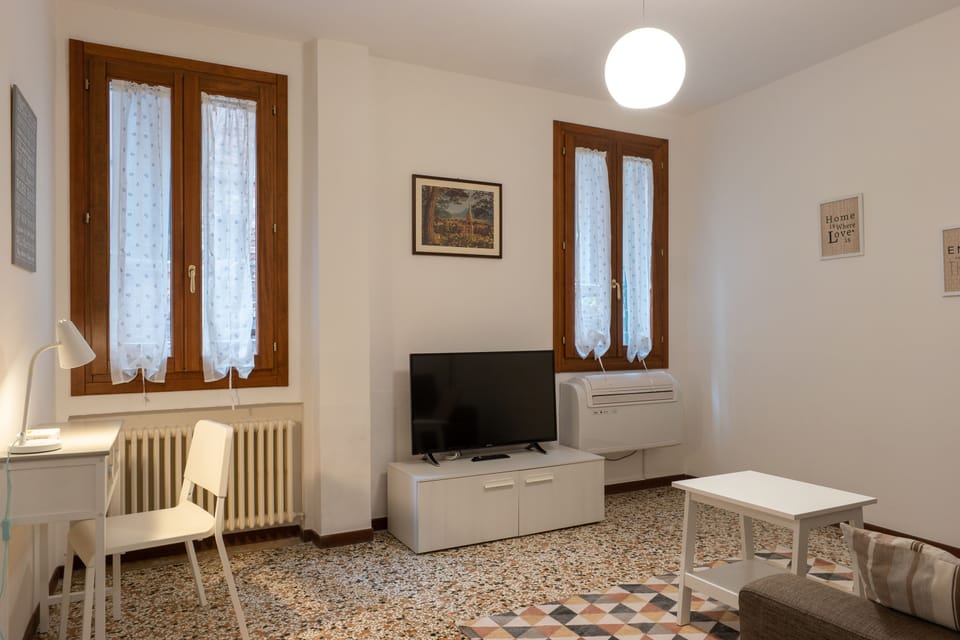City Apartment | Living area | Flat-screen TV