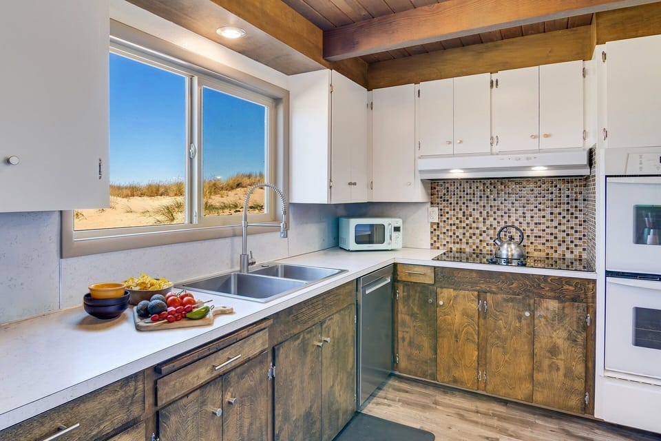 Well appointed kitchen for cooking at home all with ocean view.